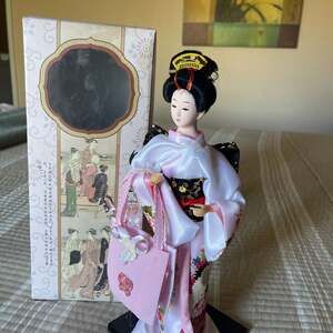 Japanese Geisha Doll in Pink Kimono Holding Fan
